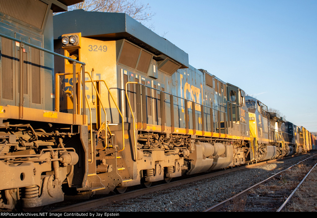 CSX 3249 trails on M427